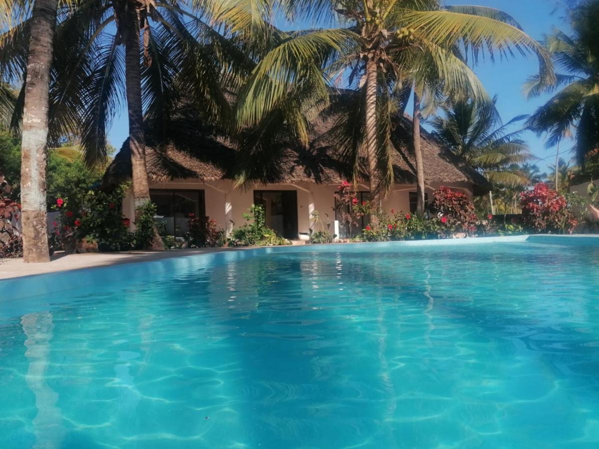 Отель Maua Beach Кизимкази Экстерьер фото